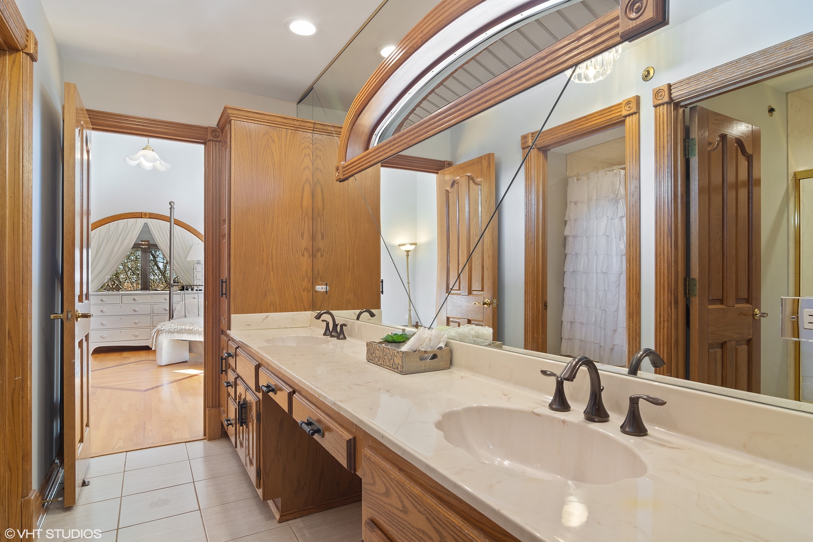5852 Teal Lane Long Grove, IL 60047 - Photo 12 of 21 a bathroom with a double vanity sink mirror and shower
