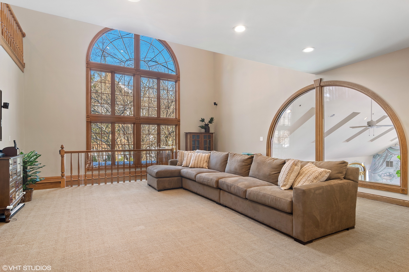 5852 Teal Lane Long Grove, IL 60047 - Photo 5 of 21 a living room with furniture a floor to ceiling window and a flat screen tv