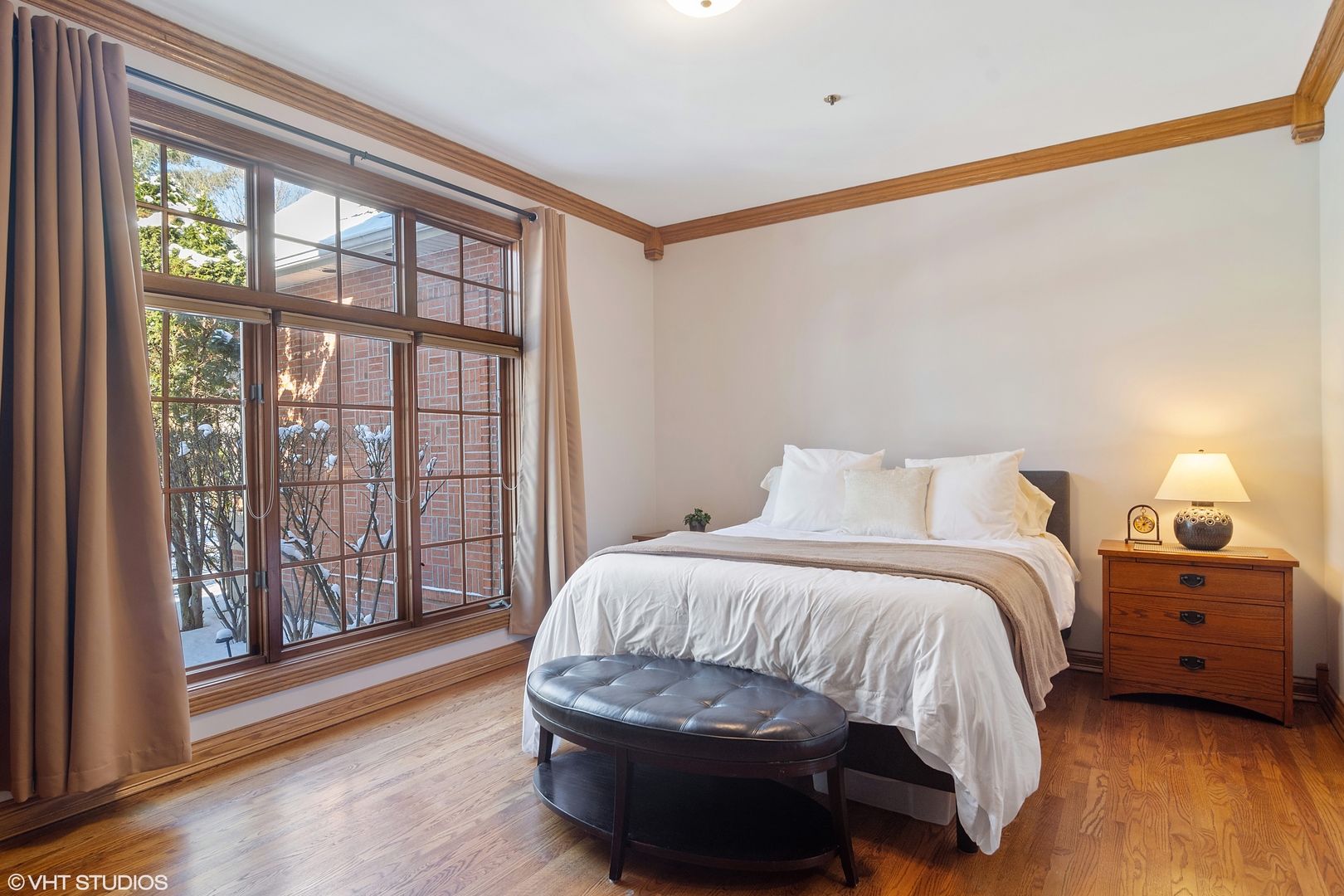 5852 Teal Lane Long Grove, IL 60047 - Photo 10 of 21 a bedroom with a bed and a large window