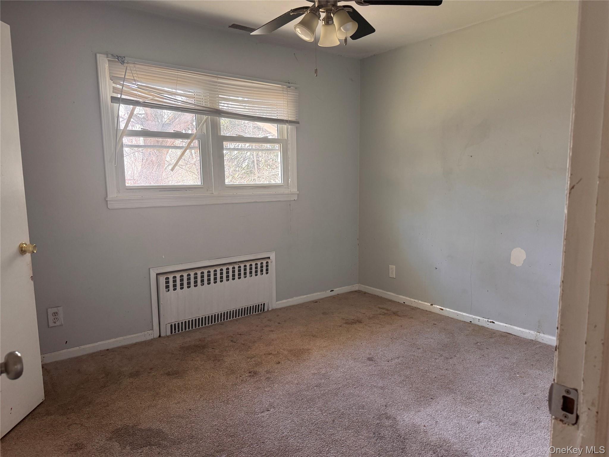 116 Williams Avenue, Unit 101 Spring Valley, NY 10977 - Photo 13 of 23 an empty room with a window