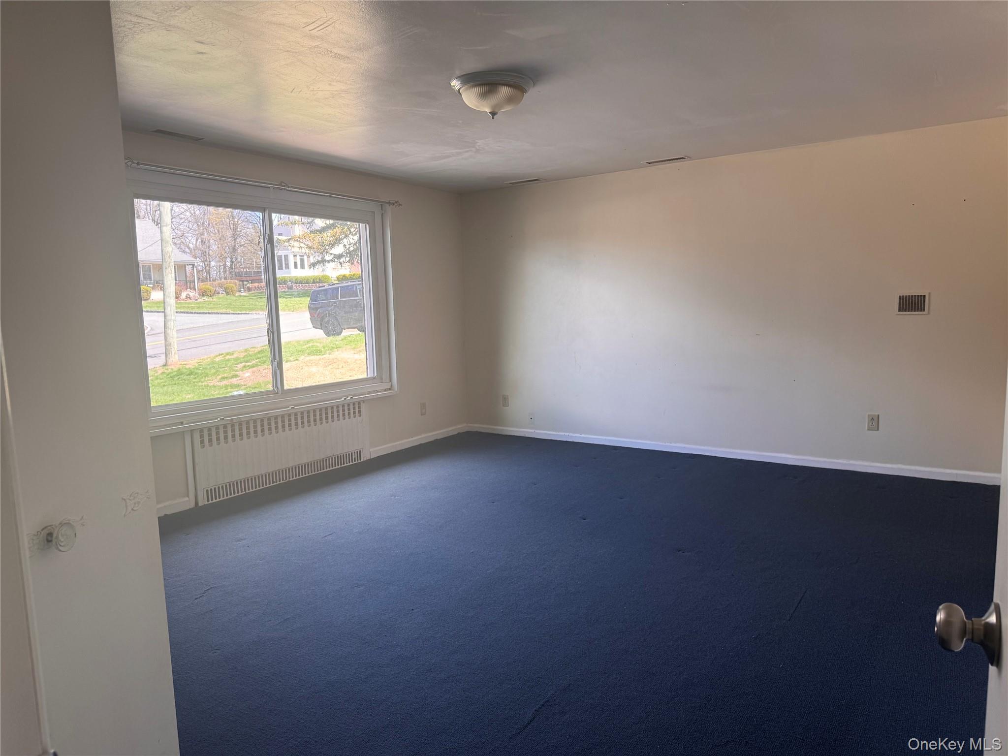 116 Williams Avenue, Unit 101 Spring Valley, NY 10977 - Photo 14 of 23 an empty room with a window