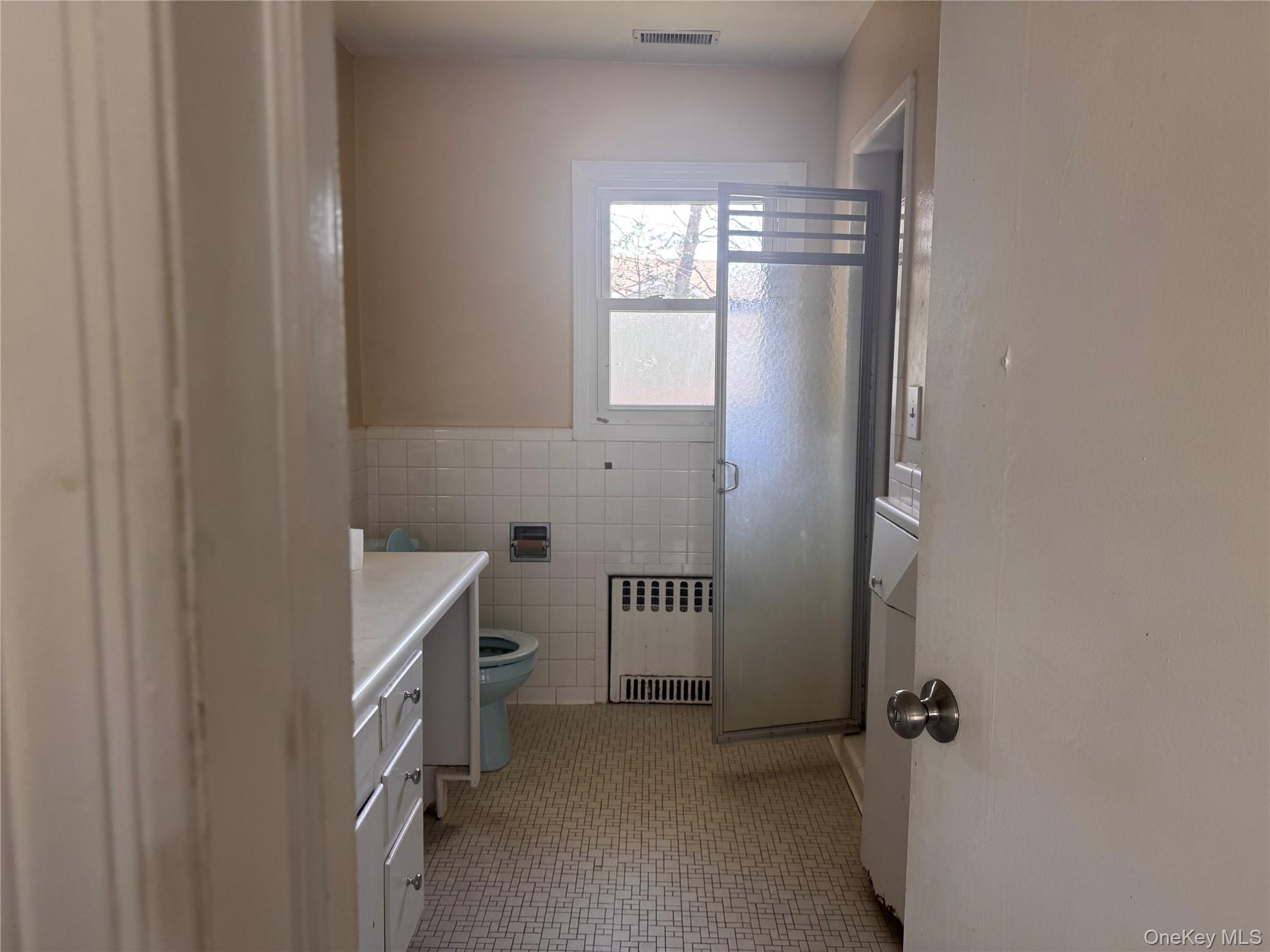 116 Williams Avenue, Unit 101 Spring Valley, NY 10977 - Photo 15 of 23 a bathroom with a bathtub and shower