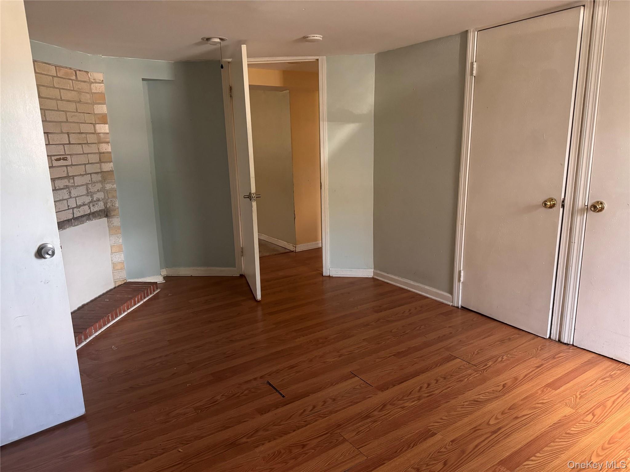 116 Williams Avenue, Unit 101 Spring Valley, NY 10977 - Photo 18 of 23 a view of hallway with wooden floor