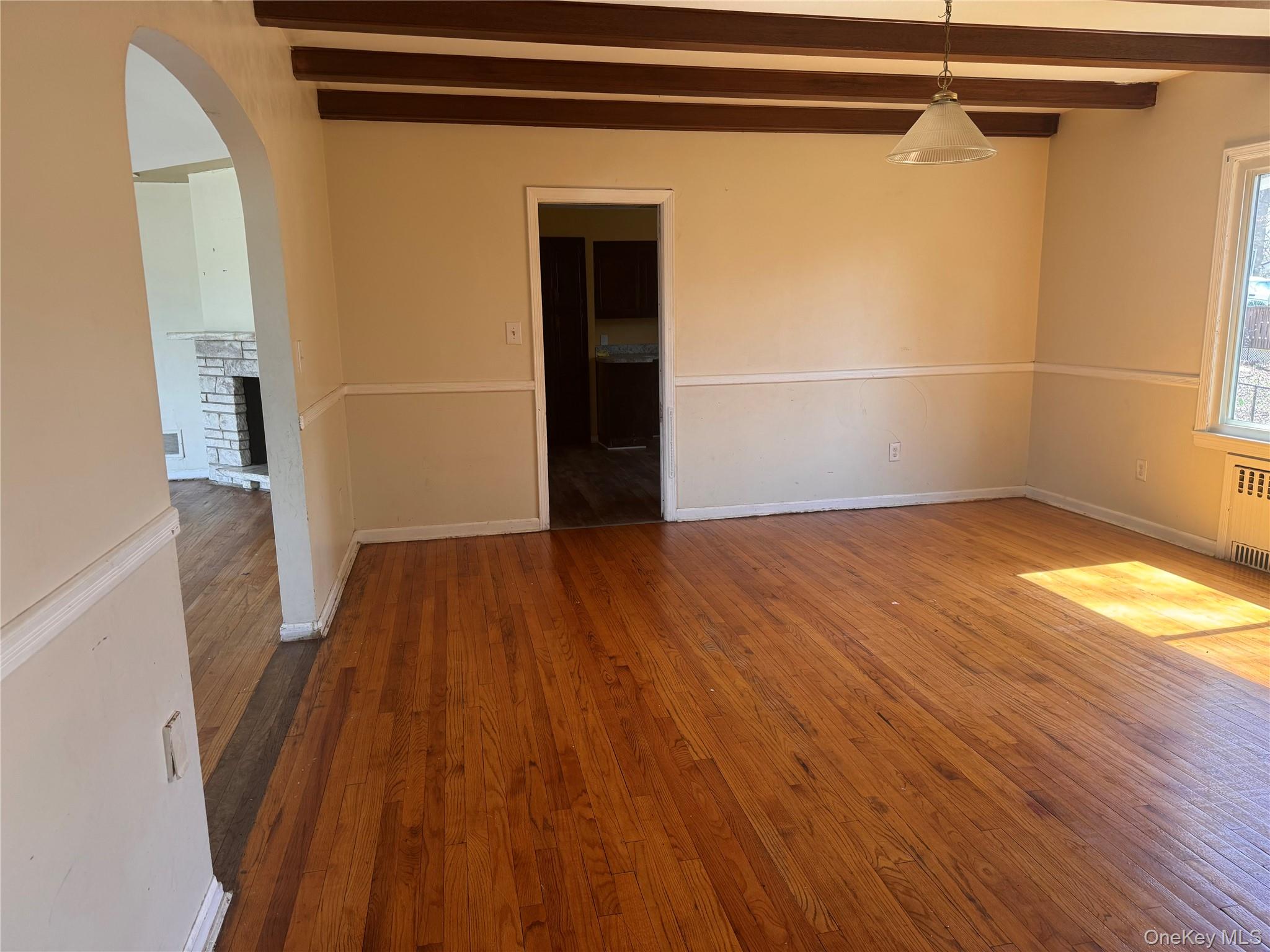 116 Williams Avenue, Unit 101 Spring Valley, NY 10977 - Photo 23 of 23 a view of a room with wooden floor and a window