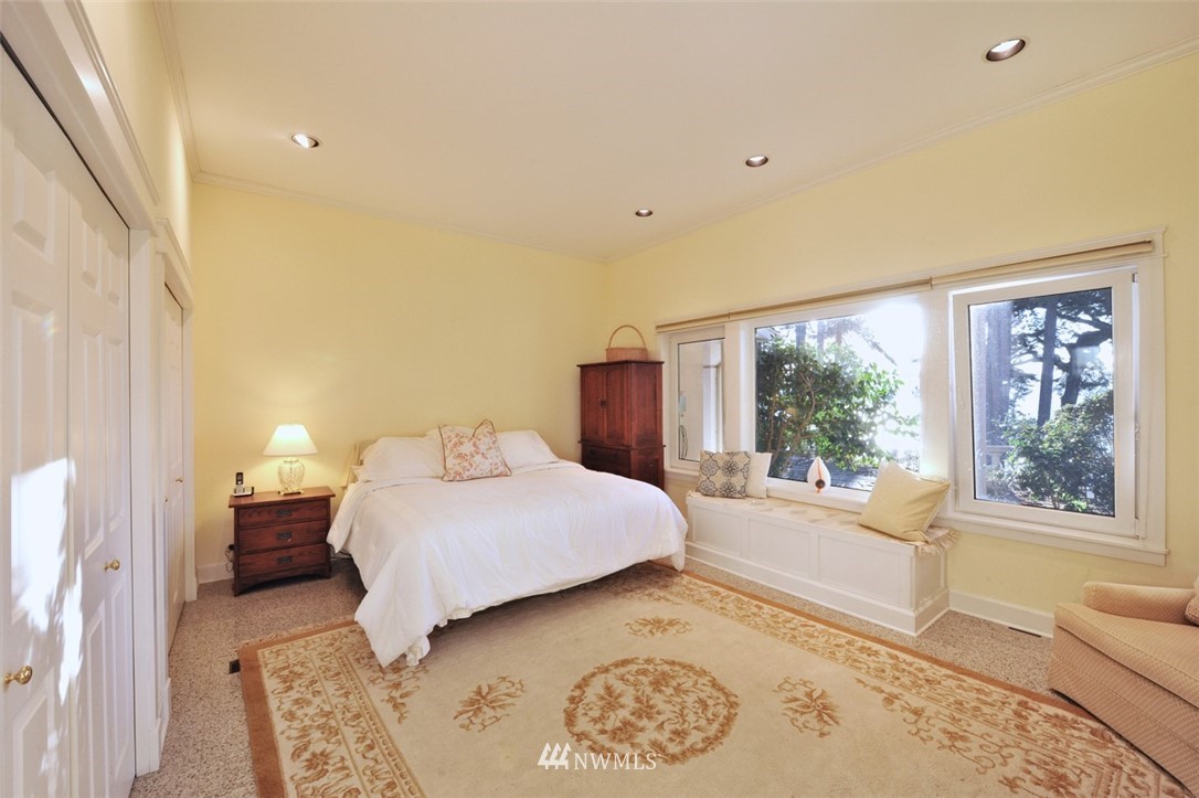 732 Fieldston Road Bellingham, WA 98225 - Photo 20 of 25 a bedroom with a large bed and a large window