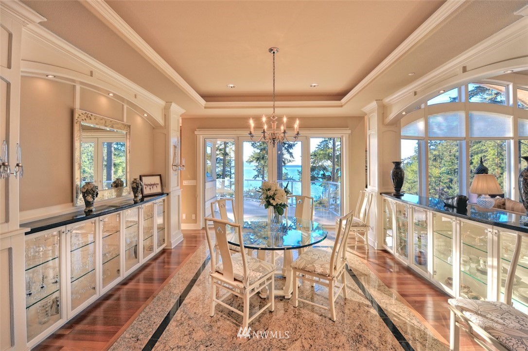 732 Fieldston Road Bellingham, WA 98225 - Photo 7 of 25 a view of a room with furniture large windows and wooden floor