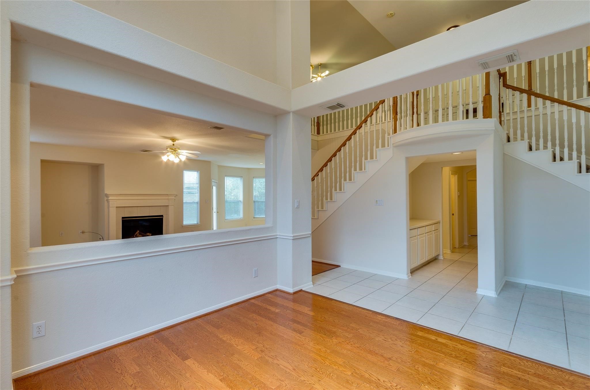 4019 Angel Spring Drive Sugar Land, TX 77479 - Photo 9 of 50 a view of a bedroom with wooden floor and windows