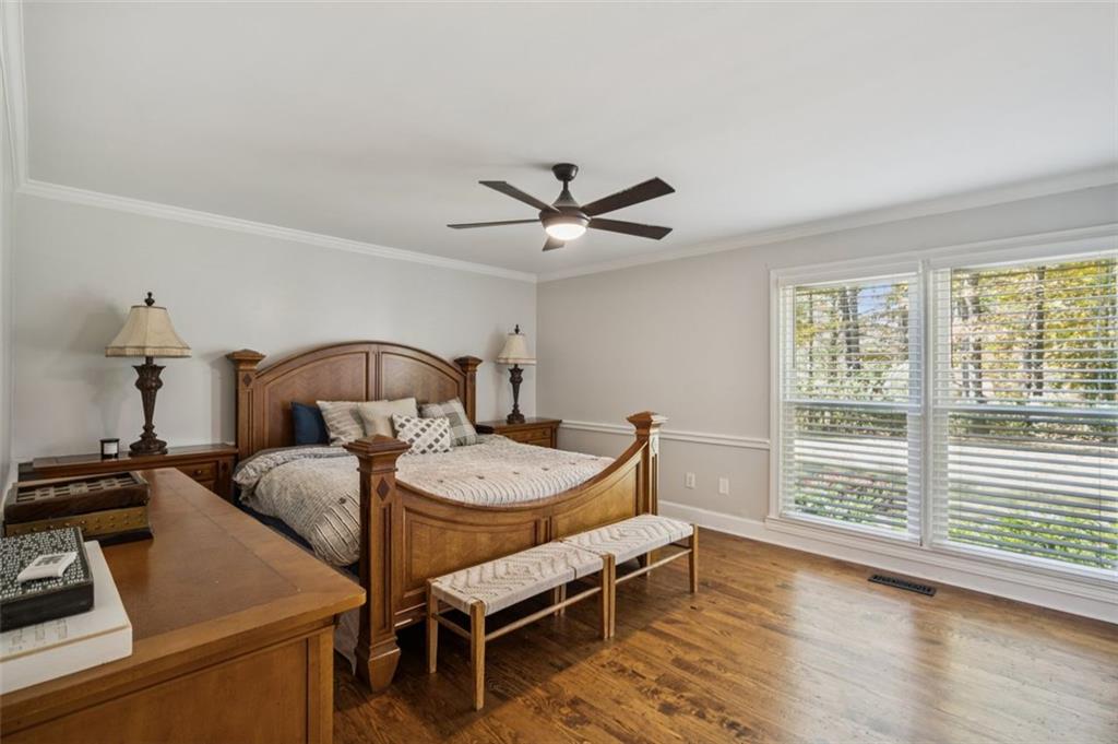 1173 Antioch Campground Road Gainesville, GA 30506 - Photo 11 of 23 a bedroom with furniture and a window