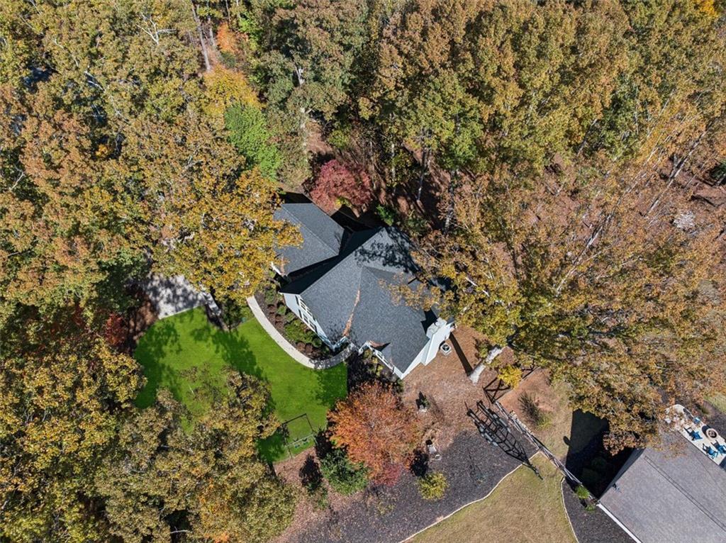 1173 Antioch Campground Road Gainesville, GA 30506 - Photo 19 of 23 an aerial view of a house with a yard