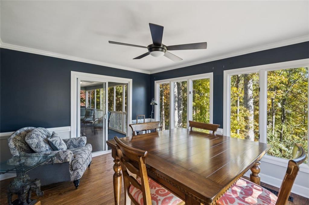 1173 Antioch Campground Road Gainesville, GA 30506 - Photo 9 of 23 a view of a dining room with furniture window and wooden floor