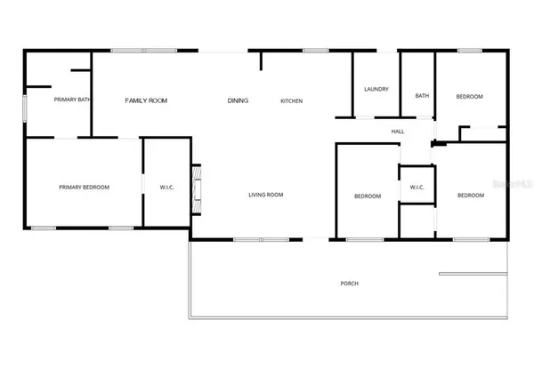a view of a yard with wooden fence