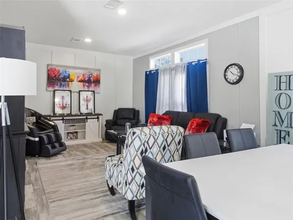 a bed room with a bed a couch and a closet