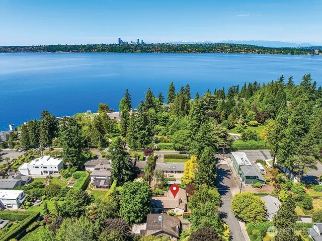 a view of a lake with a city view