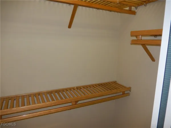 a view of a room with rack on the wall