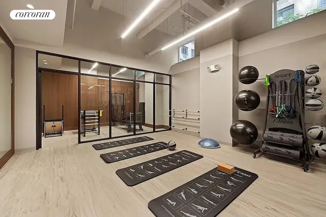 a view of a room with gym equipment
