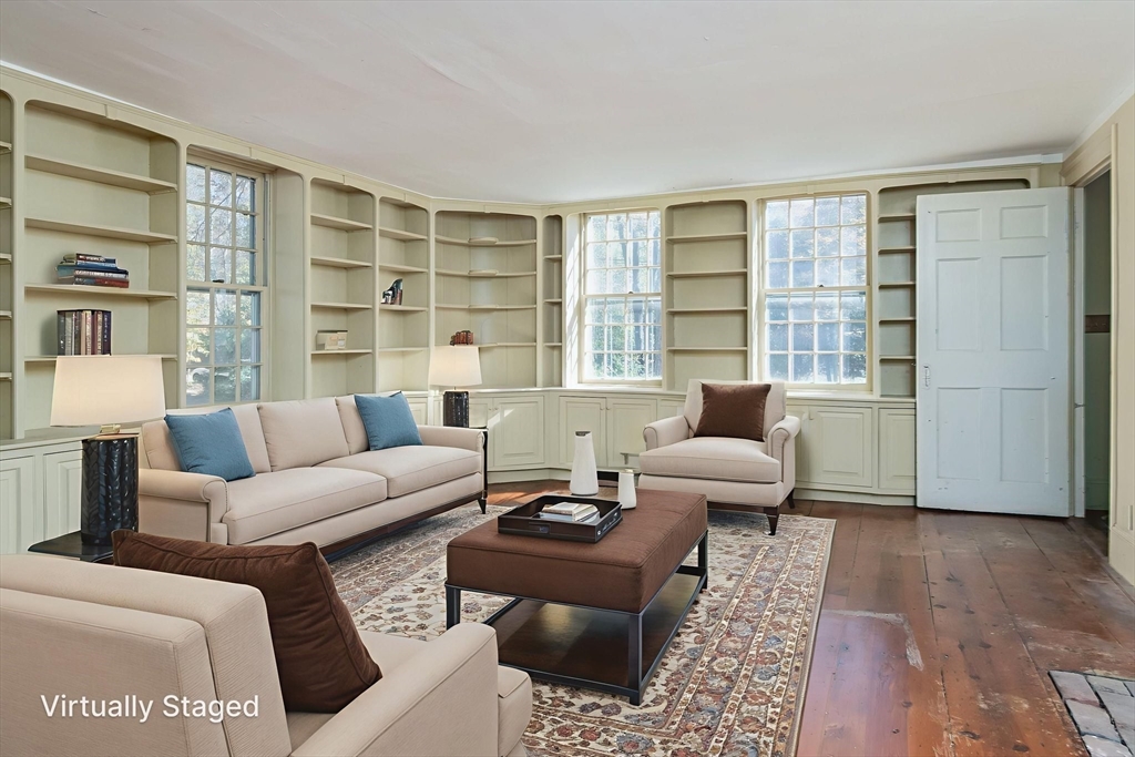 436 Main Street Groton, MA 01450 - Photo 11 of 39 a living room with furniture and a large window
