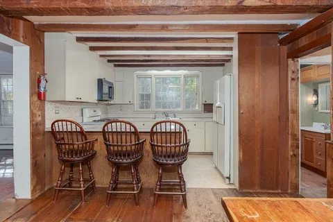 a view of furniture and wooden floor