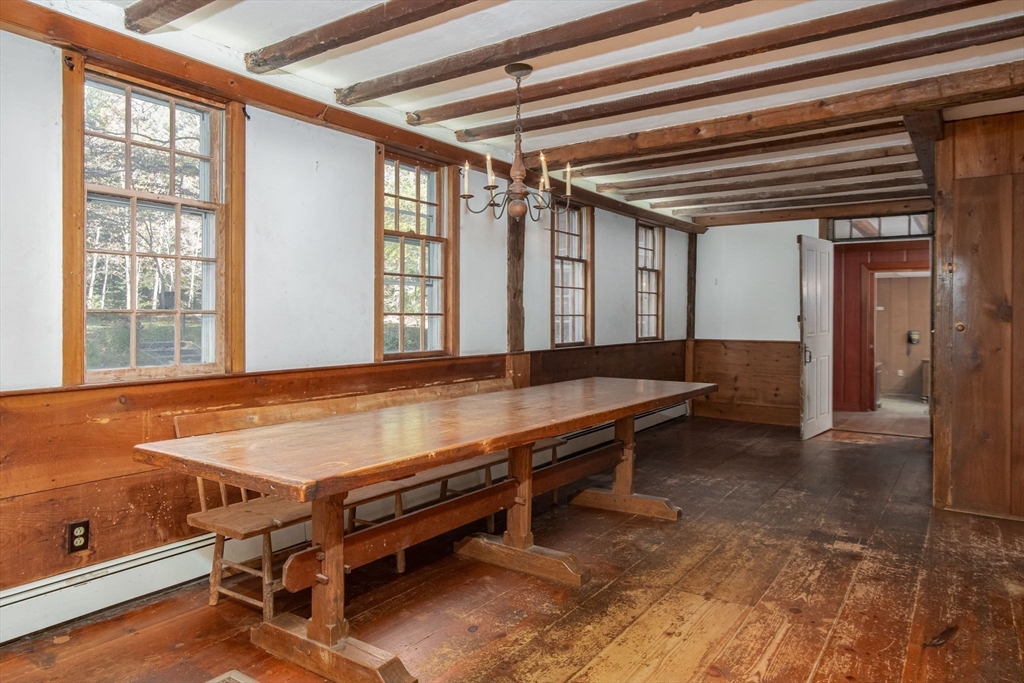 436 Main Street Groton, MA 01450 - Photo 15 of 39 a room with wooden walls and windows