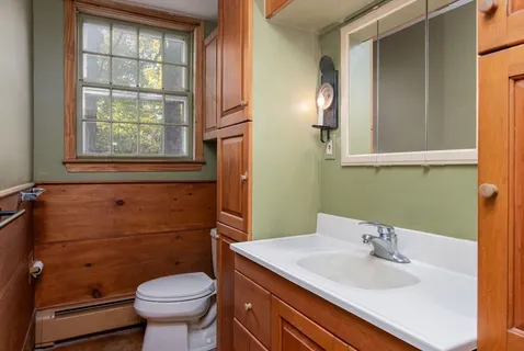 a utility room with a sink washer and dryer