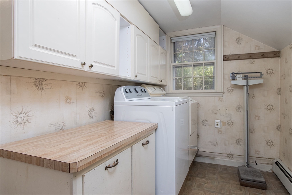 436 Main Street Groton, MA 01450 - Photo 17 of 39 a utility room with a sink washer and dryer