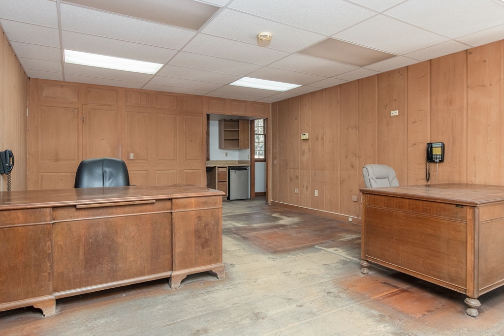 436 Main Street Groton, MA 01450 - Photo 20 of 39 a kitchen with stainless steel appliances granite countertop a sink and a stove