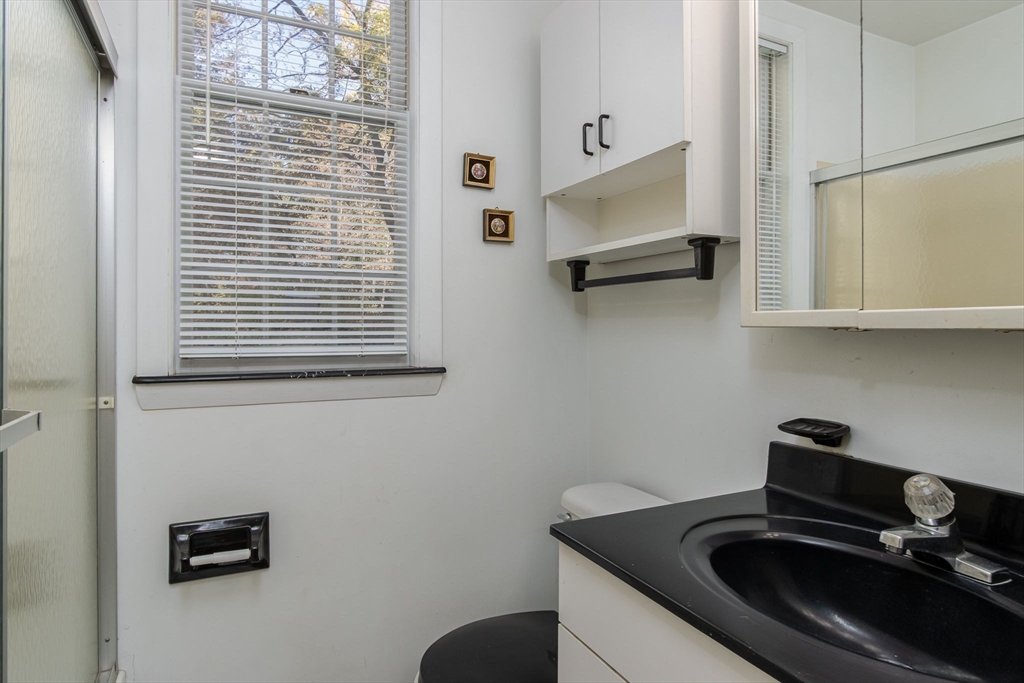 436 Main Street Groton, MA 01450 - Photo 22 of 39 a kitchen with a sink a stove and a refrigerator