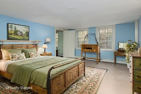 a bathroom with a sink a mirror and a bathtub