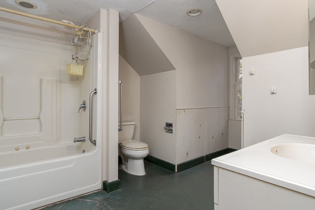436 Main Street Groton, MA 01450 - Photo 30 of 39 a bathroom with a sink toilet and shower