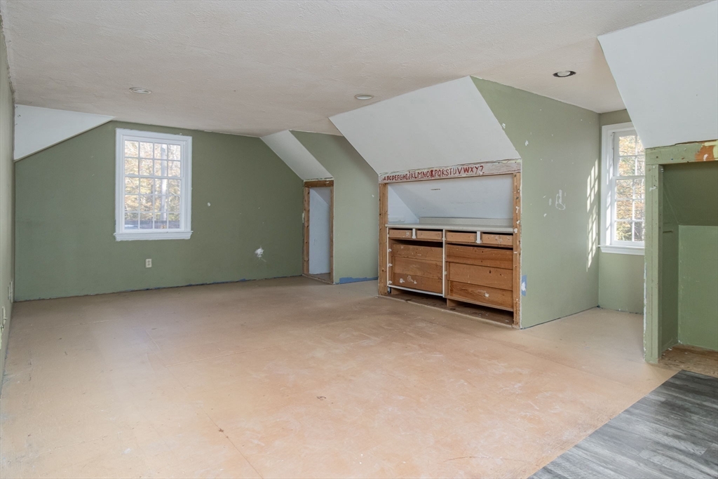 436 Main Street Groton, MA 01450 - Photo 36 of 39 an empty room with furniture and window