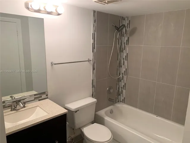 a view of a backyard with palm trees