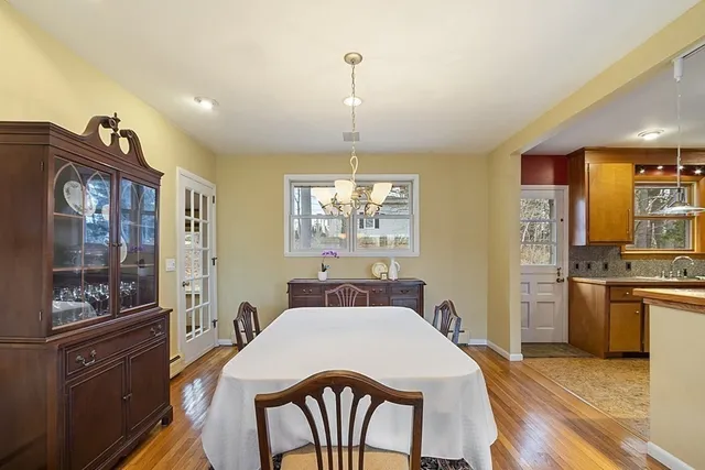 a front view of a livingroom with furniture window and wooden floor