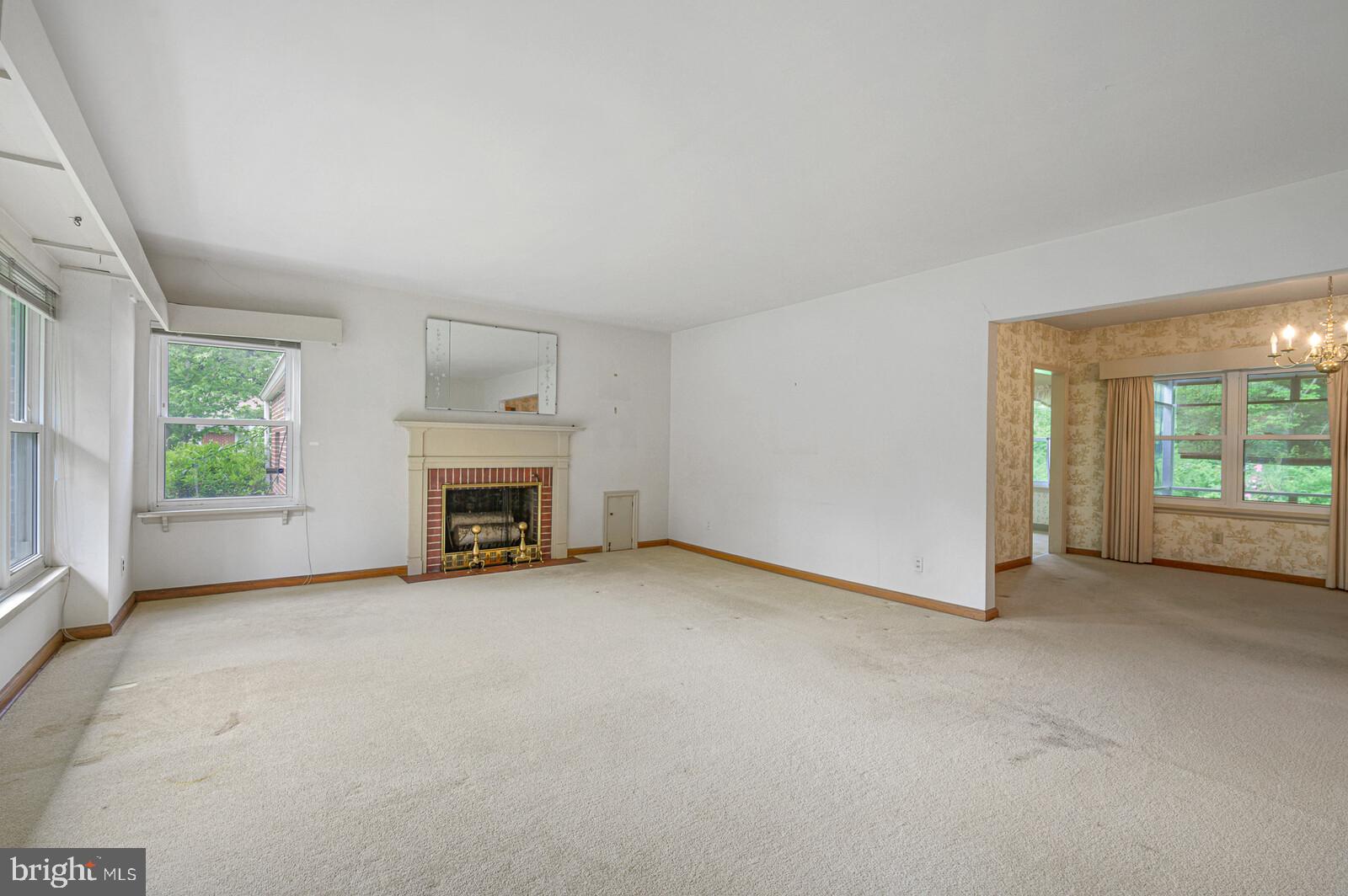 224 Beverly Road Newark, DE 19711 - Photo 3 of 20 Living Room with Wood Burning Fireplace