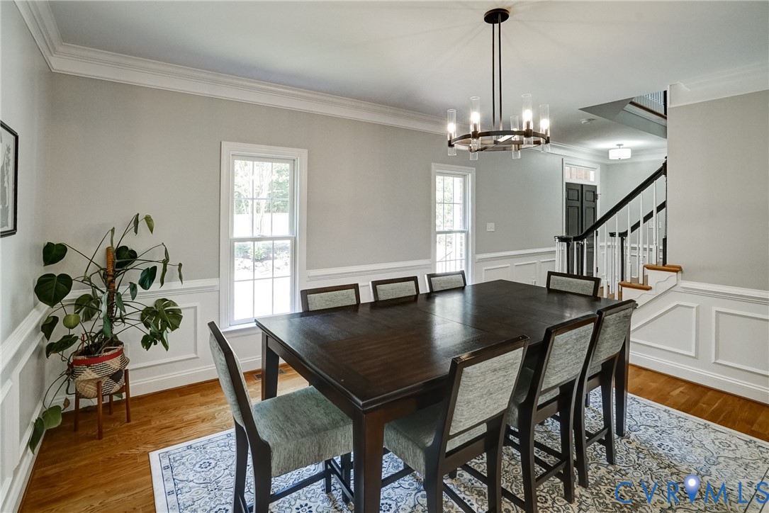 1295 Hermitage Road Manakin-Sabot, VA 23103 - Photo 33 of 55 a view of a dining room with furniture and wooden floor