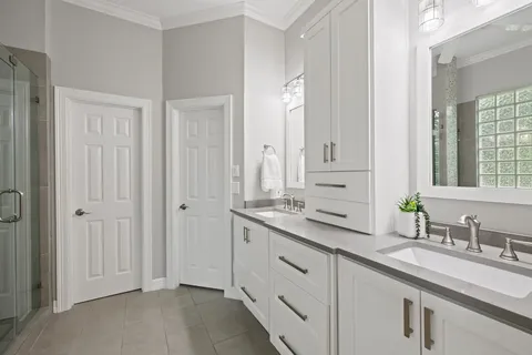 a bathroom with a bathtub and shower