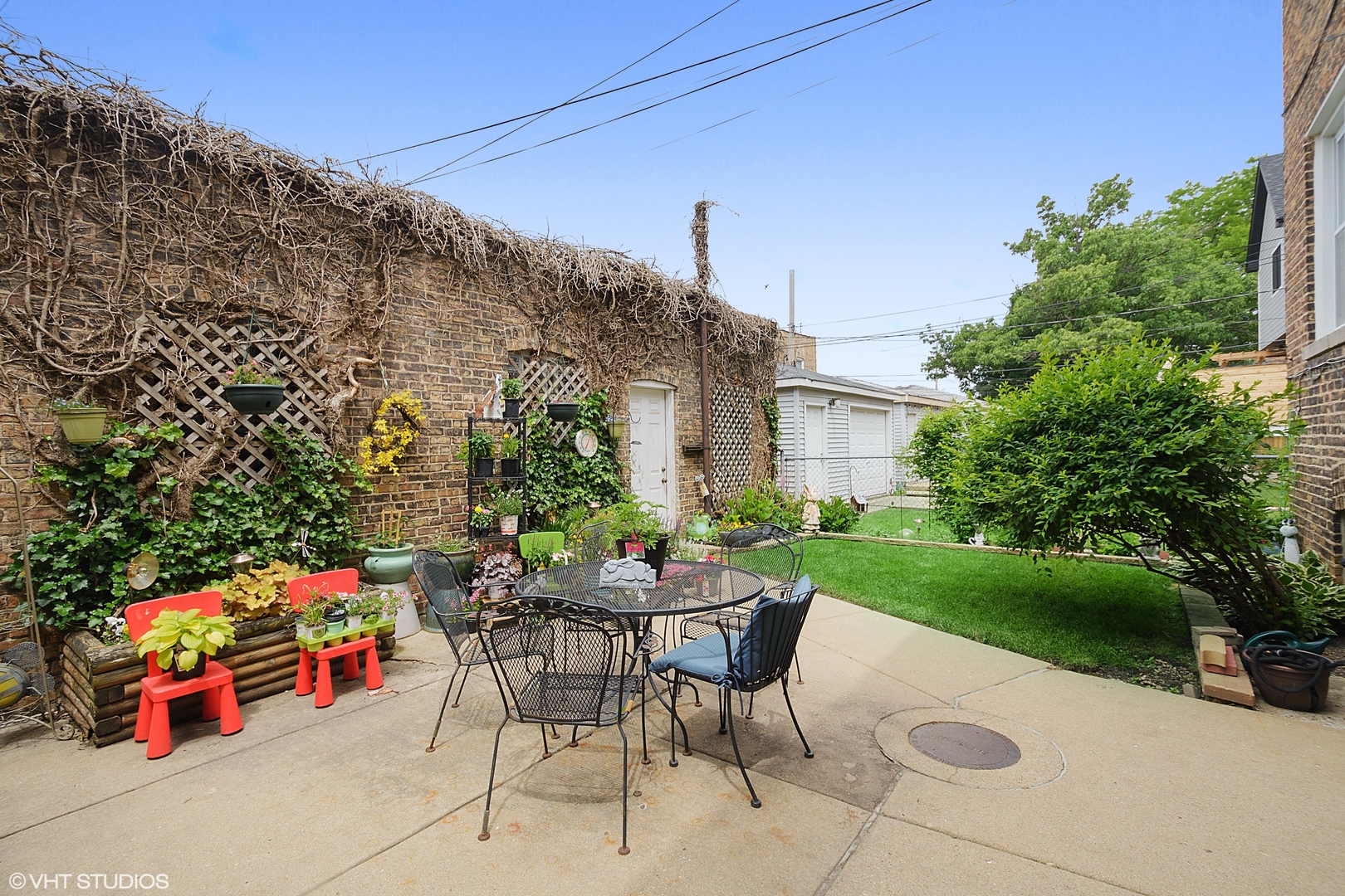 3746 North Whipple Street, Unit 2 Chicago, IL 60618 - Photo 22 of 22 a view of backyard with outdoor seating and green space