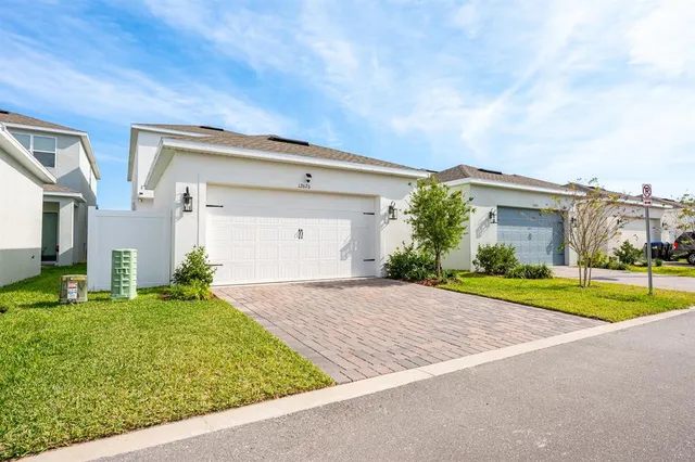 a view of a backyard of the house