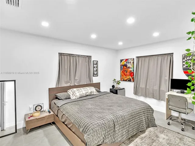 a view of swimming pool with outdoor seating