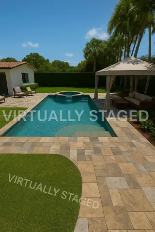 a front view of house with yard and swimming pool