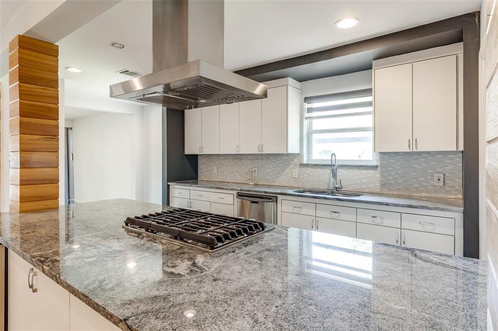5131 Urban Crest Road Dallas, TX 75227 - Photo 12 of 25 a kitchen with stainless steel appliances granite countertop a sink stove and refrigerator