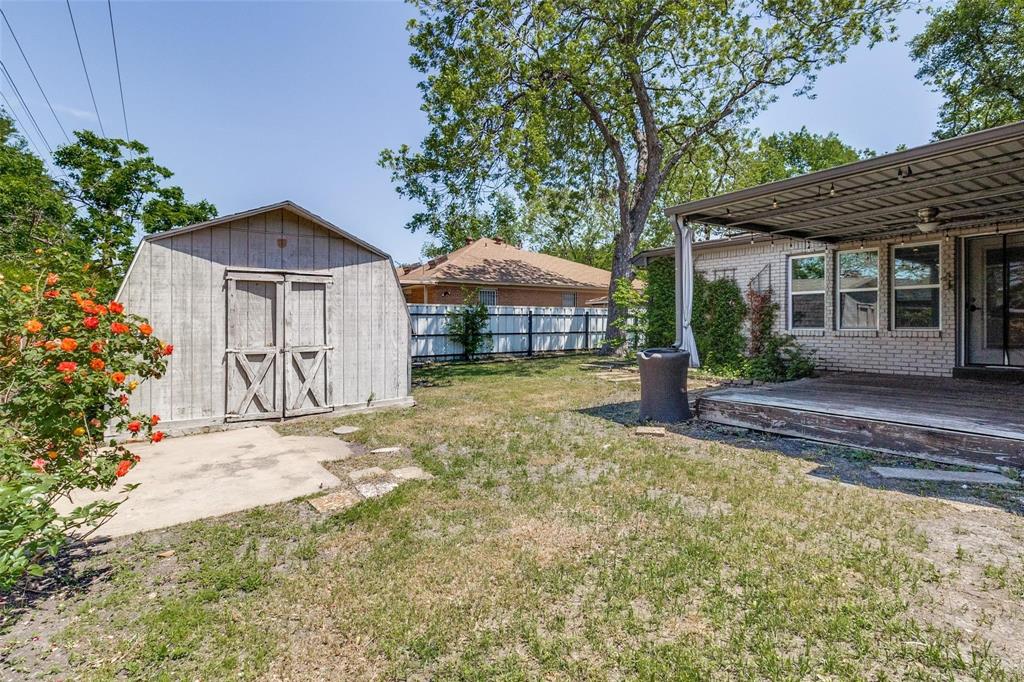 5131 Urban Crest Road Dallas, TX 75227 - Photo 24 of 25 a front view of a house with garden