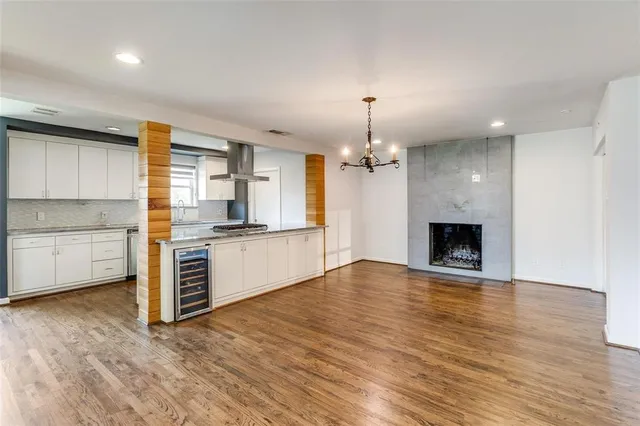 a view of a kitchen with microwave and stove