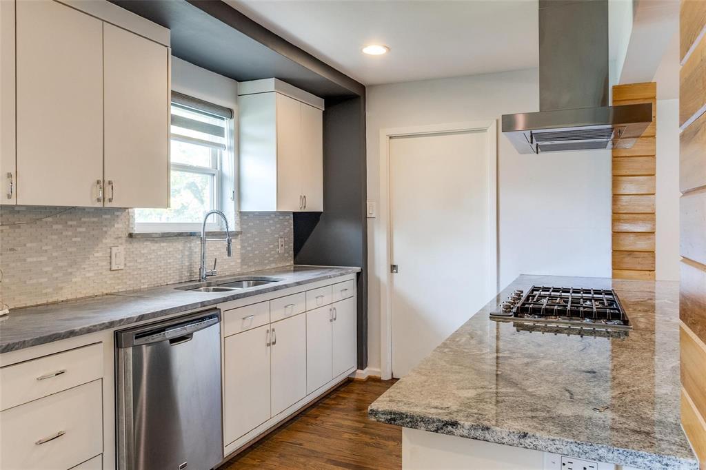 5131 Urban Crest Road Dallas, TX 75227 - Photo 10 of 25 a kitchen with stainless steel appliances granite countertop a sink stove and refrigerator