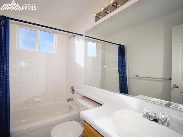 8572 Tibbs Road Peyton, CO 80831 - Photo 14 of 20 Shared upper level full bathroom.