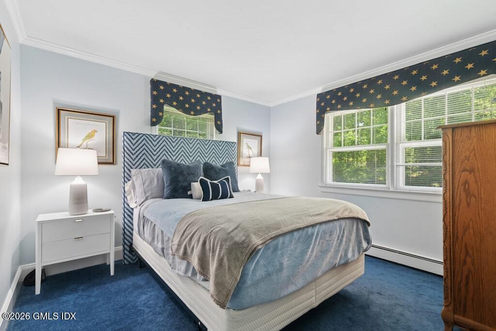 73 Thunder Mountain Road Greenwich, CT 06831 - Photo 11 of 19 a bedroom with a bed and a window