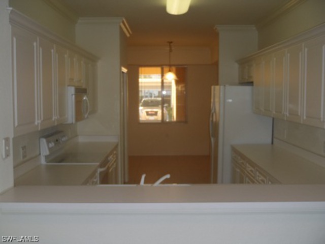 8550 Kingbird Loop Fort Myers, FL 33967 - Photo 15 of 16 a bathroom with a bathtub and a shower