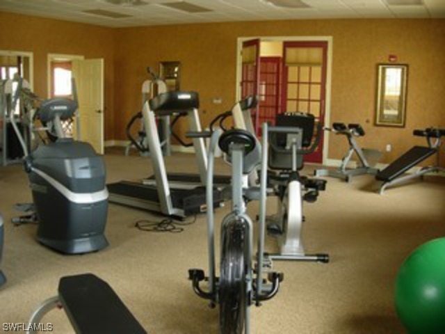 8550 Kingbird Loop Fort Myers, FL 33967 - Photo 7 of 16 a view of a room with gym equipment