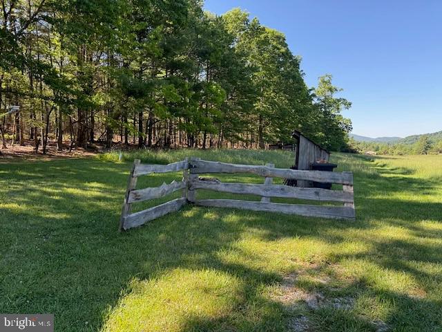 184 Skiles- Pitsenbarger Road Franklin, WV 26807 - Photo 27 of 39 Serene pasture with rustic fencing.