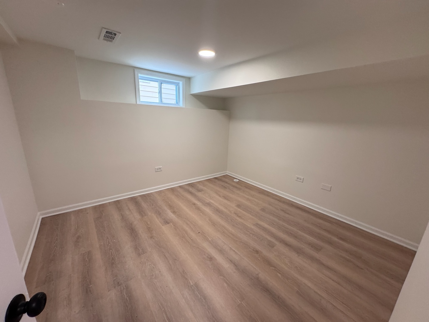 754 Spring Road Elmhurst, IL 60126 - Photo 26 of 32 a view of an empty room with wooden floor