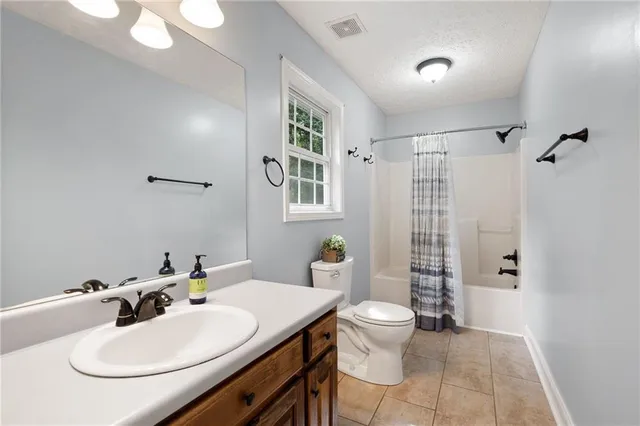 a view of balcony with furniture and wooden deck