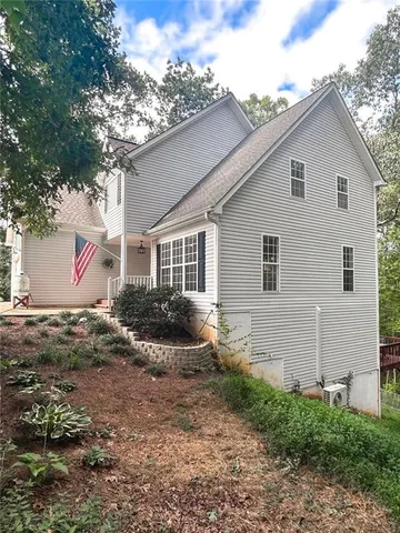 view of a forest with a houses